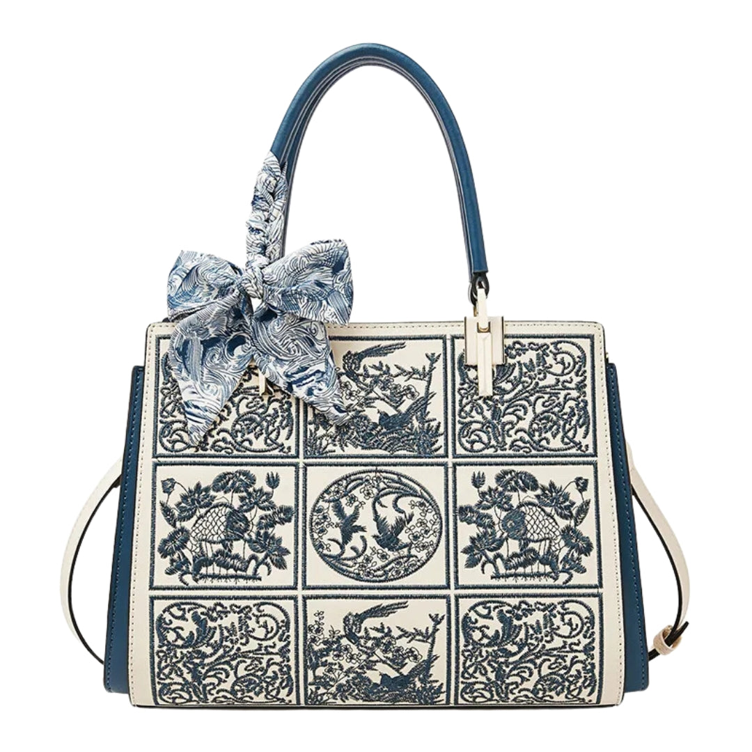 Vada™ – A unique crossbody bag with embroidery and a bow