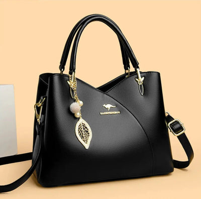 Oaklyn - Elegant black shoulder bag with fashionable pendants
