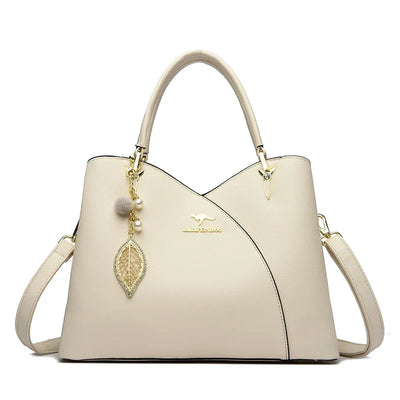 Oaklyn - Elegant black shoulder bag with fashionable pendants