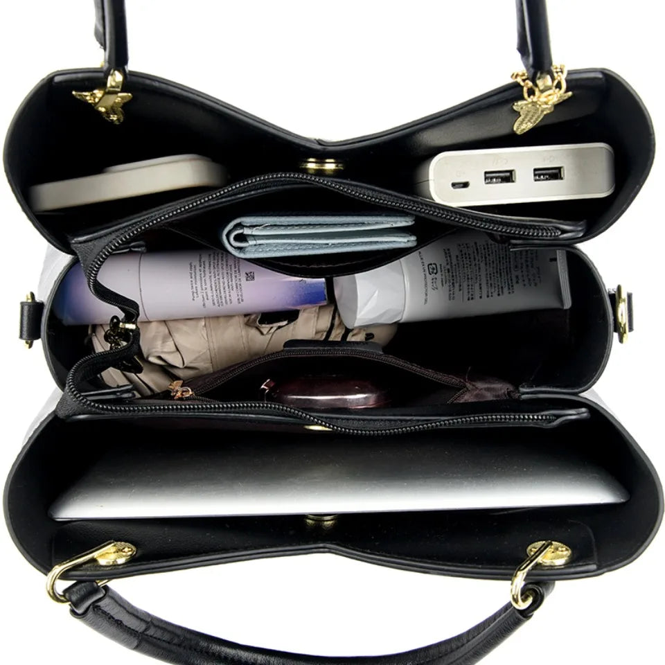 Oaklyn - Elegant black shoulder bag with fashionable pendants