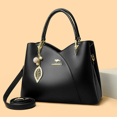 Oaklyn - Elegant black shoulder bag with fashionable pendants