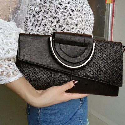 Audrey - Elegant black handbag with a leather finish