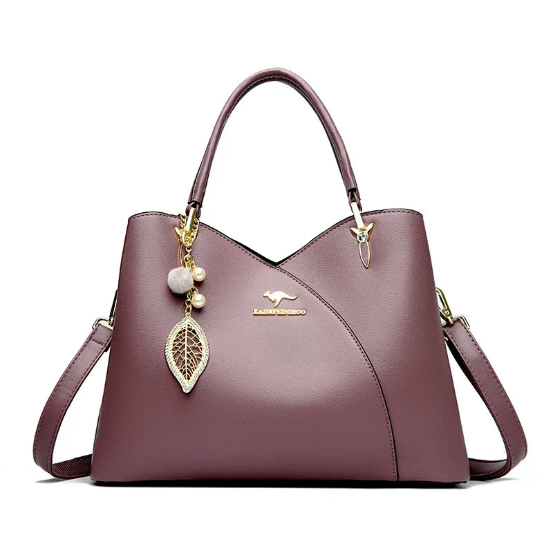 Oaklyn - Elegant black shoulder bag with fashionable pendants