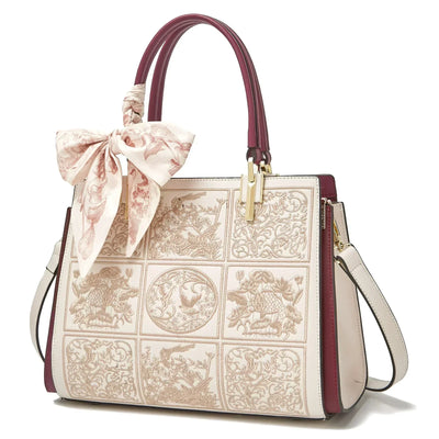 Vada™ – A unique crossbody bag with embroidery and a bow