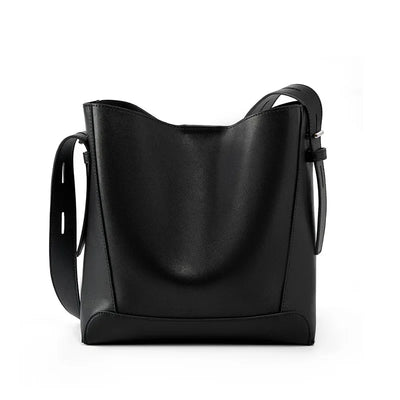 Moxie™ – A stylish sand-colored shoulder bag with a strap handle