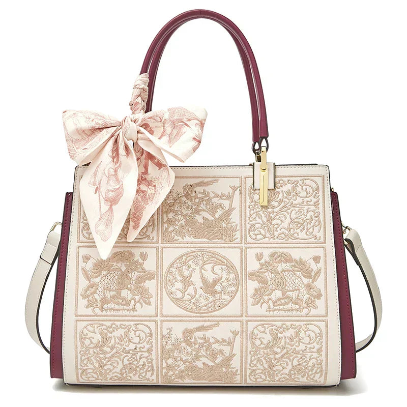 Vada™ – A unique crossbody bag with embroidery and a bow