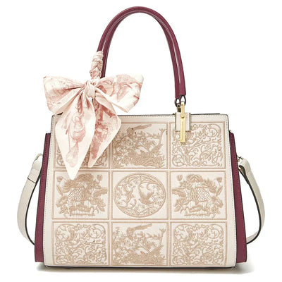 Vada™ – A unique crossbody bag with embroidery and a bow